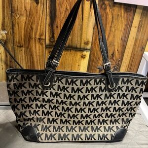 Michael Kors Black and Tan Tote with Monogram Pattern